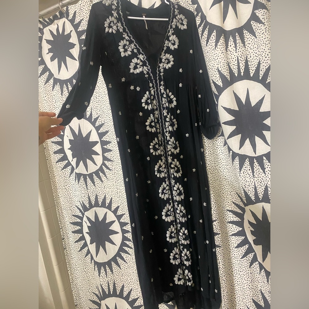 Black embroidered free people dress. Worn a handful of times.